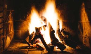 Fire in Brick Fireplace and How to Clean the Dirty Bricks.
