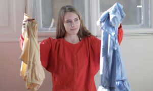 Woman Sorting Laundry and How to Laundry Day More Efficient.
