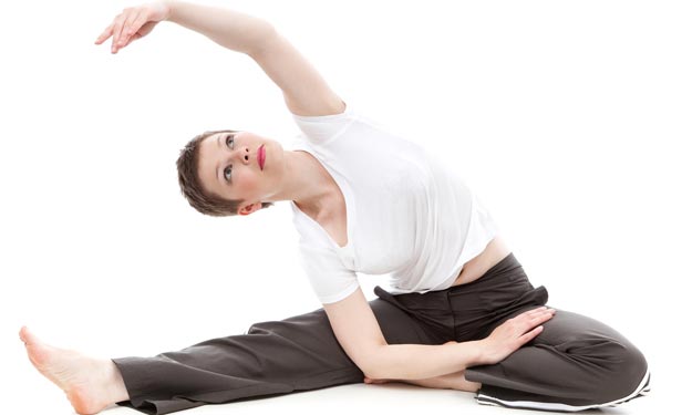 Woman Exercising and How She Can Remove Deodorant Stains from Shirt.