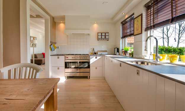 A Bright Kitchen with Clean Quartz Countertops.
