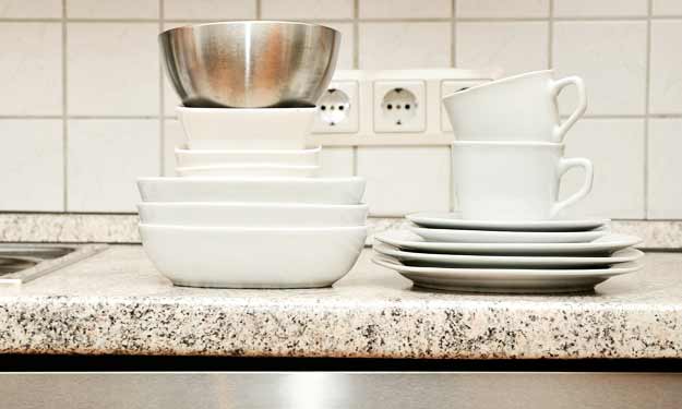 Clean Dishware Sitting on Countertop.