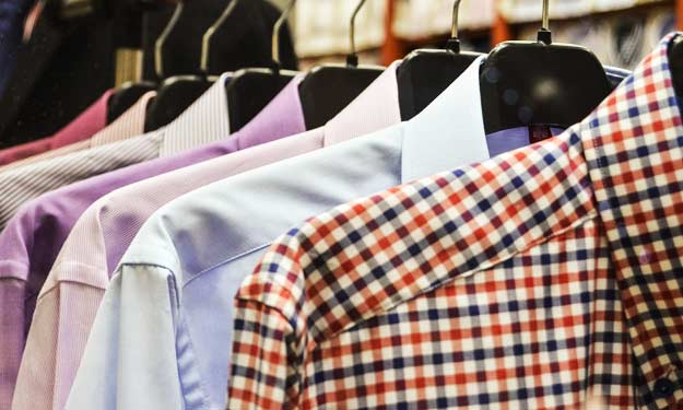 Starched Shirts Hanging in a Closet.