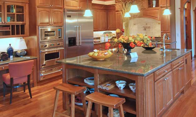 Beautiful Kitchen with Stainless Steel Appliances that Have Been Cleaned to a Shine.