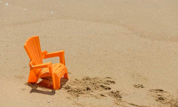 A Plastic Chair on the Beach and How to Clean It.